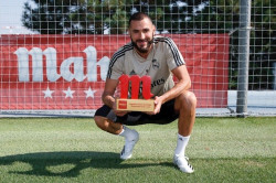 Benzema: "Veo al equipo bien, tenemos que seguir la l&iacute;nea de la Liga"